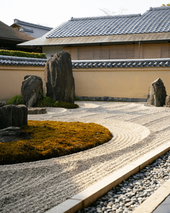 Serene traditional Japanese Zen garden with perfectly raked sand and rocks