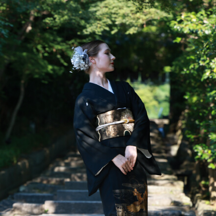 Beautiful woman wearing a traditional silk kimono in Kyoto